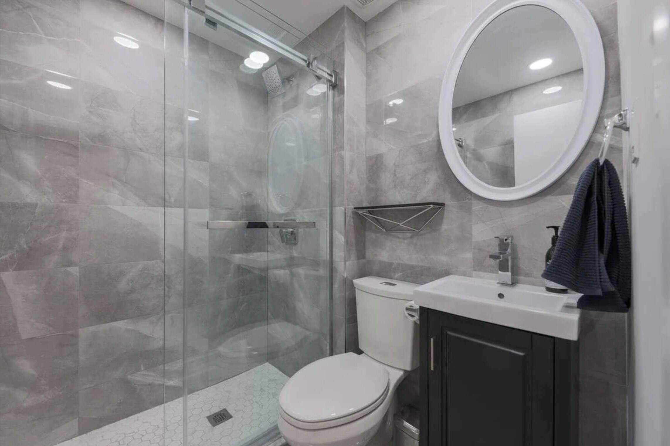 Original listing bathroom photo 1 for Casa Hotels: Modern 2BR Suite in Leslieville